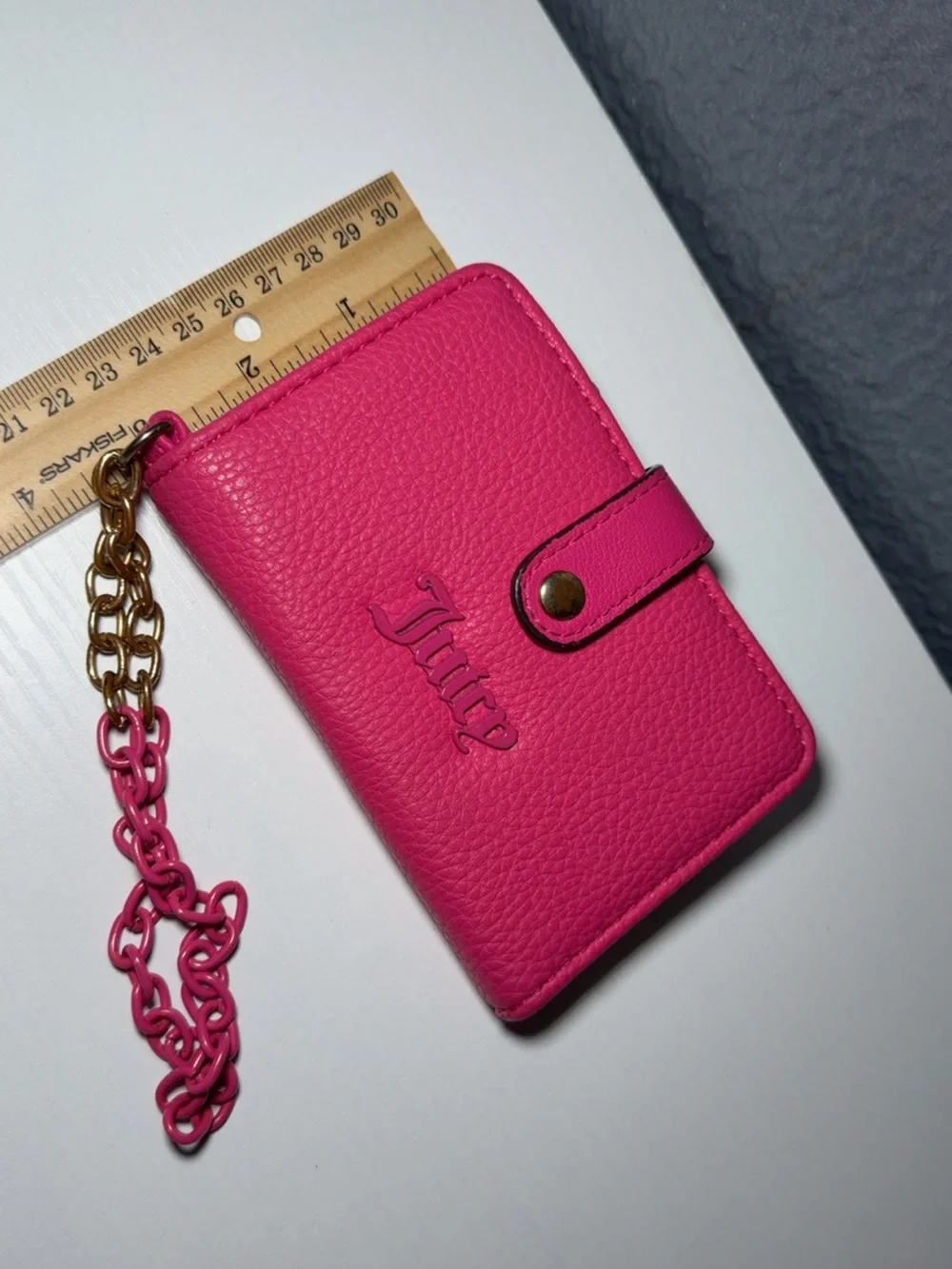 Juicy Couture compact leather